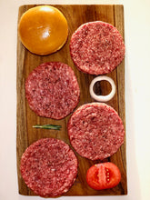 Load image into Gallery viewer, Beringer Family Farms 21 Day Dry Aged Angus Beef Collection. Photo of 4, 1/3 pound hamburger patties.
