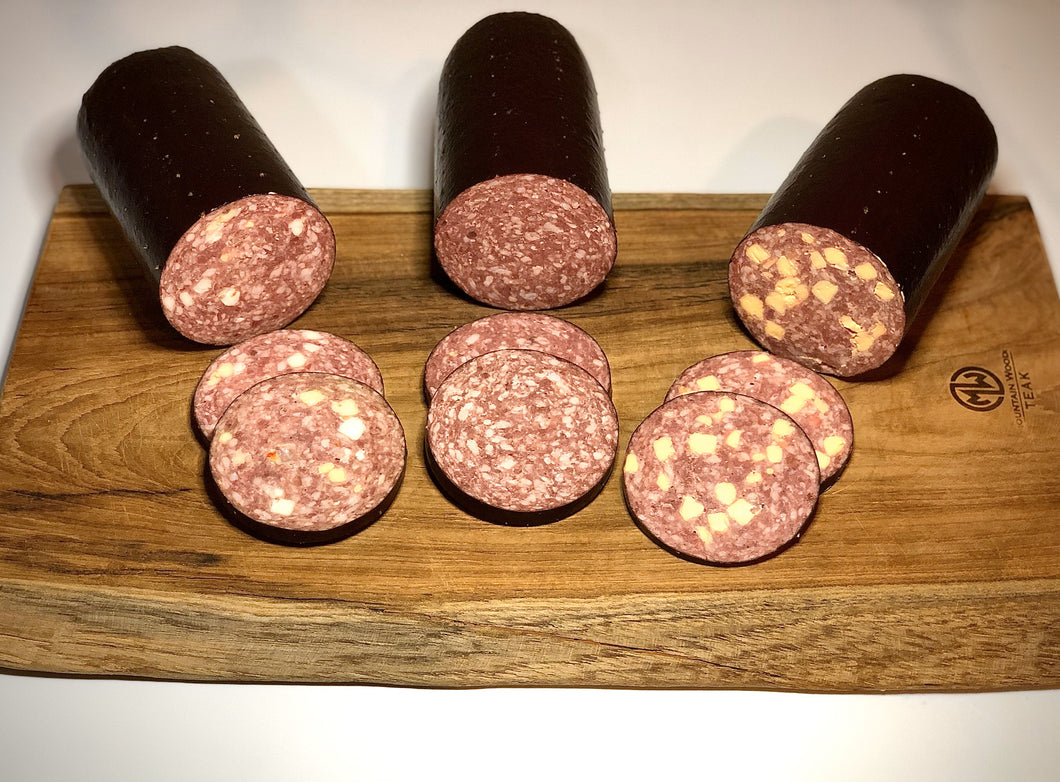 Beringer Family Farms 21 Day Dry Aged Angus Beef Collection. Photo of 3 different flavors of beef sausage.